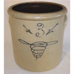 Blue decorated stoneware crock with ears