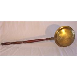 Early brass bed warmer