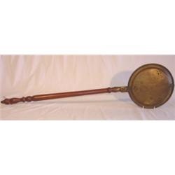 Early pierced brass bed warmer