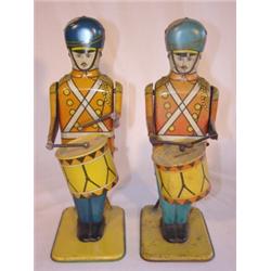 Pair of Wolverine No. 27 Drum Major tin toys