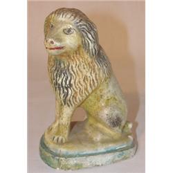 Early chalkware lion figurine