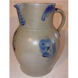 Blue decorated stoneware pitcher