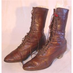 Pair of ladies lace up leather boots