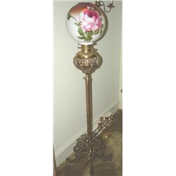 Ornate brass piano lamp