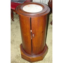 Circular marble top plant stand with door
