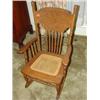 Image 1 : Ornate oak child's cane bottom rocking chair