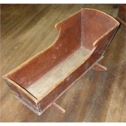 Original red painted and dovetailed baby cradle
