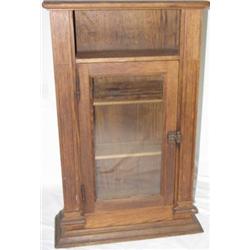 Oak wall medicine cabinet with glass door