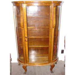 Oak china closet with claw feet