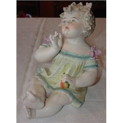 Fine porcelain bisque piano baby