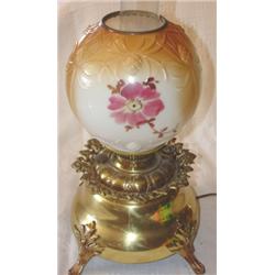 Ornate brass floral decorated table lamp
