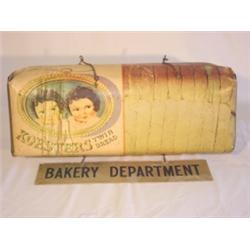 Koester's Twin Bread bread loaf display sign