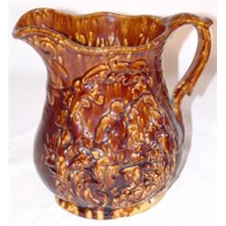 Bennington yelloware handled pitcher