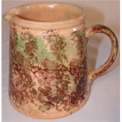 Yelloware seaweed decorated handled pitcher