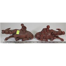 PAIR OF VINTAGE HAND CARVED WOOD BULLS WITH GLASS