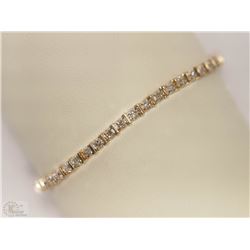 #42-10KT YELLOW GOLD DIAMOND TENNIS BRACELET