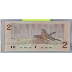 CANADIAN 1986 TWO DOLLAR NOTE ROBIN SERIES X2