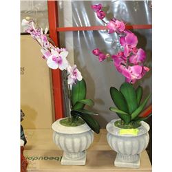TWO DECORATIVE PLANTERS WITH FAUX FLOWERS