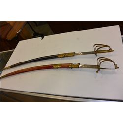 TWO CAVALRY SWORDS IN SHEATHS