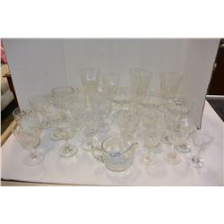 SHELF LOT OF CRSYTAL STEMWARE AND CORN FLOWER CREAM AND