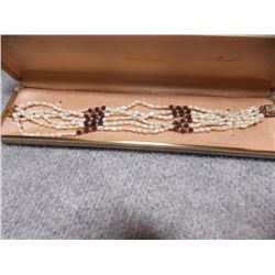 BRACELET - 6 STRAND NATURAL PEARLS
