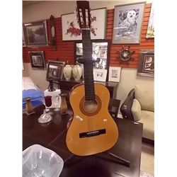 ODYSSEY ACOUSTIC GUITAR - STAND NOT INCLUDED