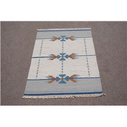Hand woven, Indian wool pile on cotton foundation Rug