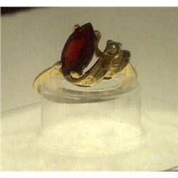 RING - 1.2 CT MARQUIS FACETTED GARNET SET IN 18K YELLOW GOLD OFF SET LEAF DESIGN - INCLUDES CERTIFIC