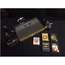 ATARI GAME SYSTEM WITH CONTROLLERS & GAMES