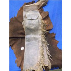 Marked The AA Kraft Co. Spokane, Stovepipe Chaps, Buck stitched –Tooled Belt, Pockets –Fringed