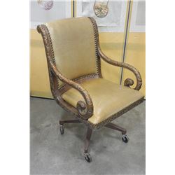 CARVED WOOD & LEATHER ROLLING ARMCHAIR