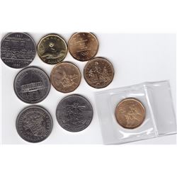 9 Commemorative Canada Dollars