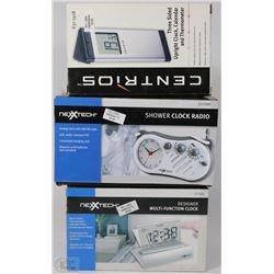LOT WITH TWO CLOCKS AND ONE SHOWER CLOCK RADIO