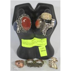 HAND STATUE FILLED WITH RINGS AND BAG OF COPPER RI