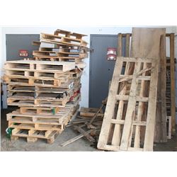 3 LARGE STACKS OF WOOD PALLETS
