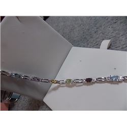 BRACELET - 9 OVAL FACETTED MULTI GEMSTONES & DIAMOND IN STERLING SILVER SETTING - RETAIL ESTIMATE $4
