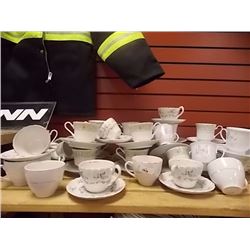 TEA CUPS AND SAUCERS