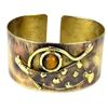 Image 1 : Tucked Tiger Eye Brass Cuff - Brass Images (C)