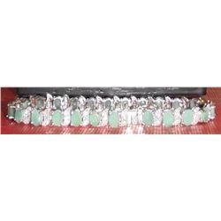 25 emeralds new bracelet with certificate of $1250 - bracelet neuf avec 25 emeraudes + certificat