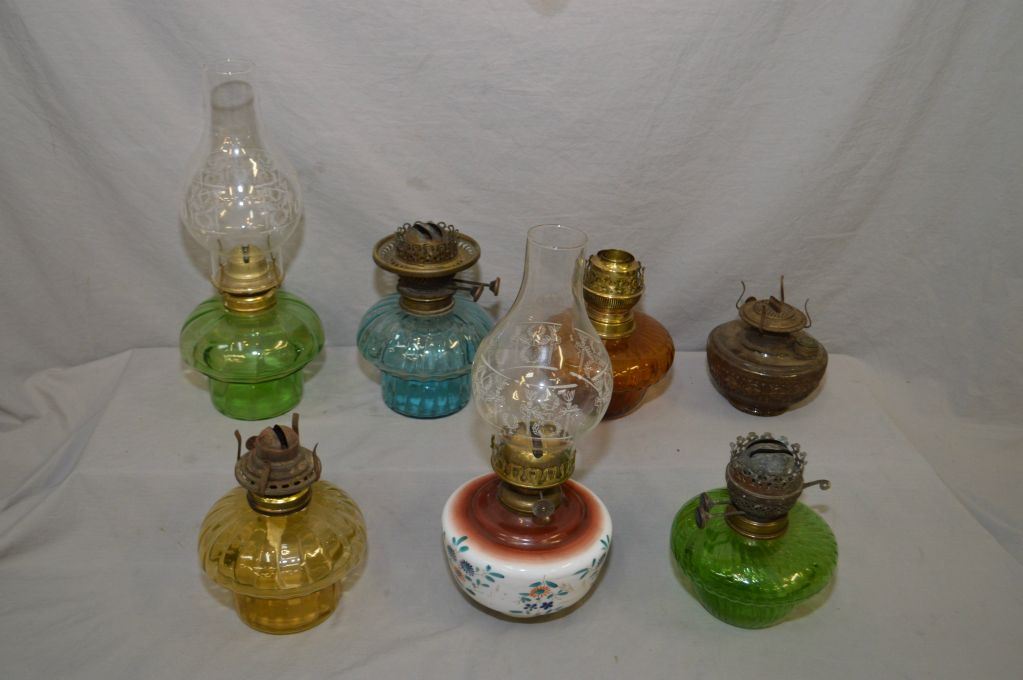 Lot of seven antique glass oil lamp fonts