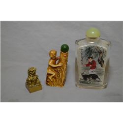 Reverse painted glass snuff bottle, a carved figural snuff bottle with jade topper and a small foo d