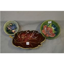 Two pieces of Moorcroft pottery including hibiscus bowl 5 1/2  in diameter and small Spring flowers 