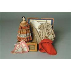 9" GERMAN PAPIER-MÂCHÉ MILLINER'S MODEL WITH WARDROBE