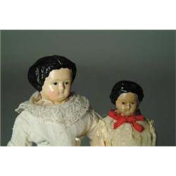 2 PAPIER-MÂCHÉ DOLLS