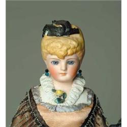 16" GERMAN PARIAN WITH MOLDED HAIR AND FEATHERS