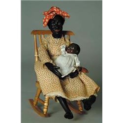 15" BLACK CARVED WOODEN LADY HOLDING A BLACK BABY
