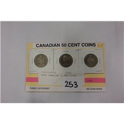 THREE CANADIAN 50 CENT COINS