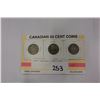 Image 1 : THREE CANADIAN 50 CENT COINS