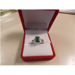 RING - EMERALD FACETED EMERALD & 2 DIAMONDS IN STERLING SILVER SETTING - RETAIL ESTIMATE $350