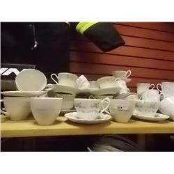 TEA CUPS AND SAUCERS